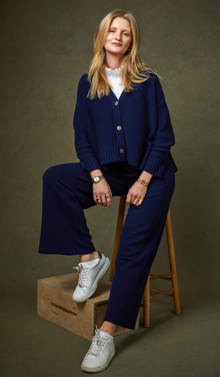 Creative editorial portrait with refined tones, controlled lighting, and detailed retouching