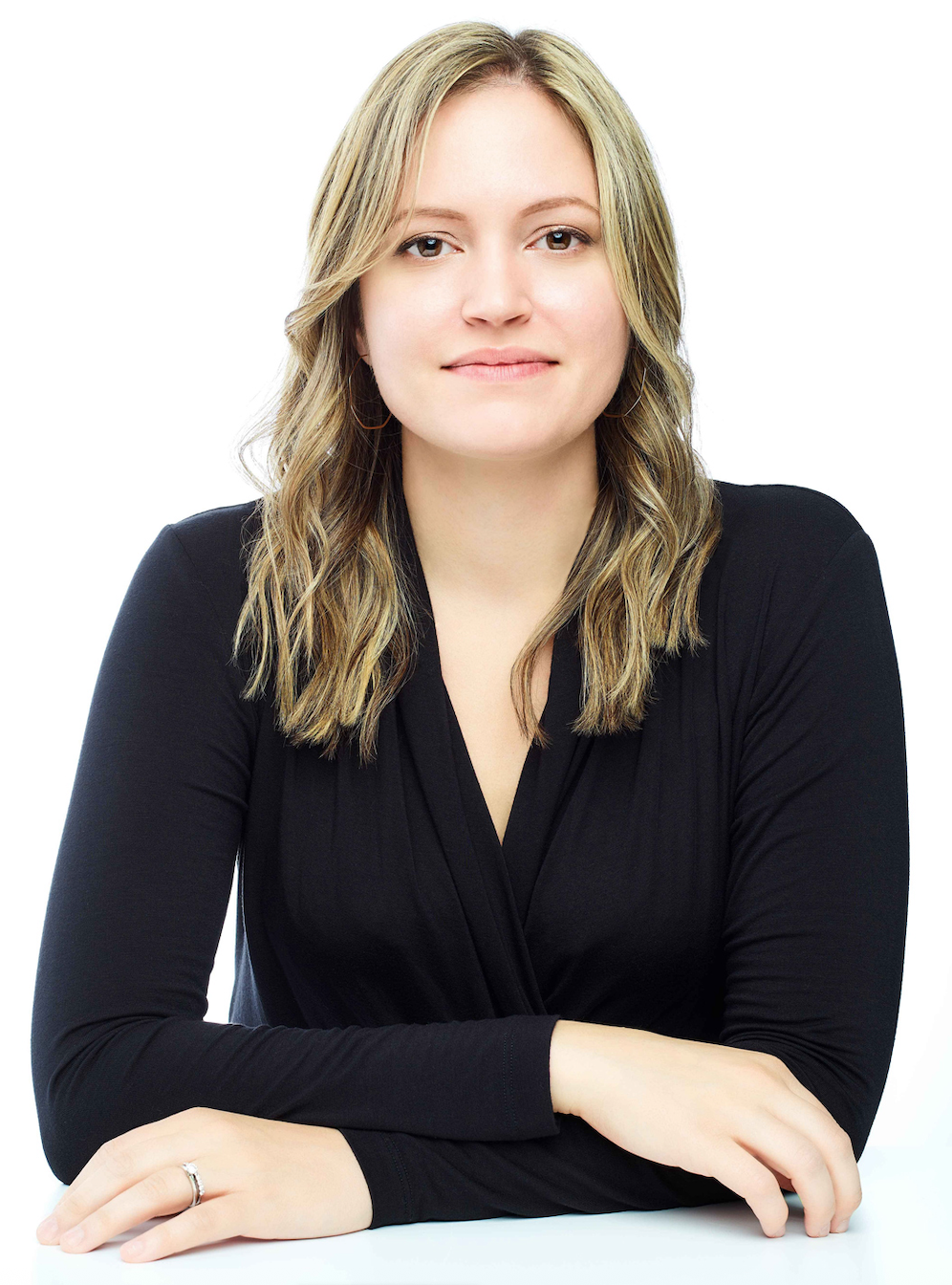 Corporate headshot with natural facial refinement, clean skin tones, and polished presentation