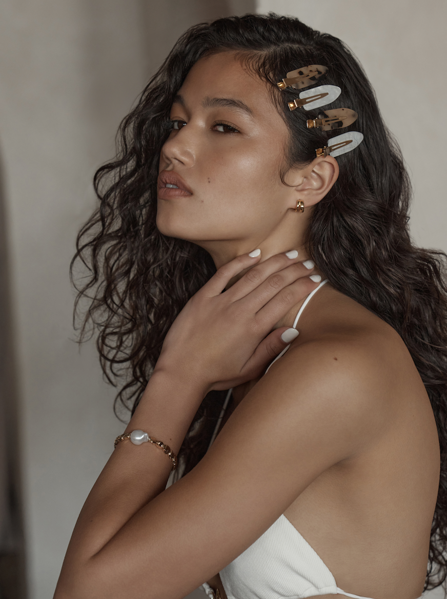 hair accessories styled in editorial composition, improved using light balancing and tonal shaping across retail visuals