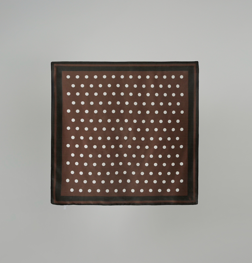 structured to support clean display, scarf flat lay is improved with fold alignment and edge precision