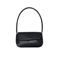 panel alignment and edge finishing reveal construction precision in small leather goods