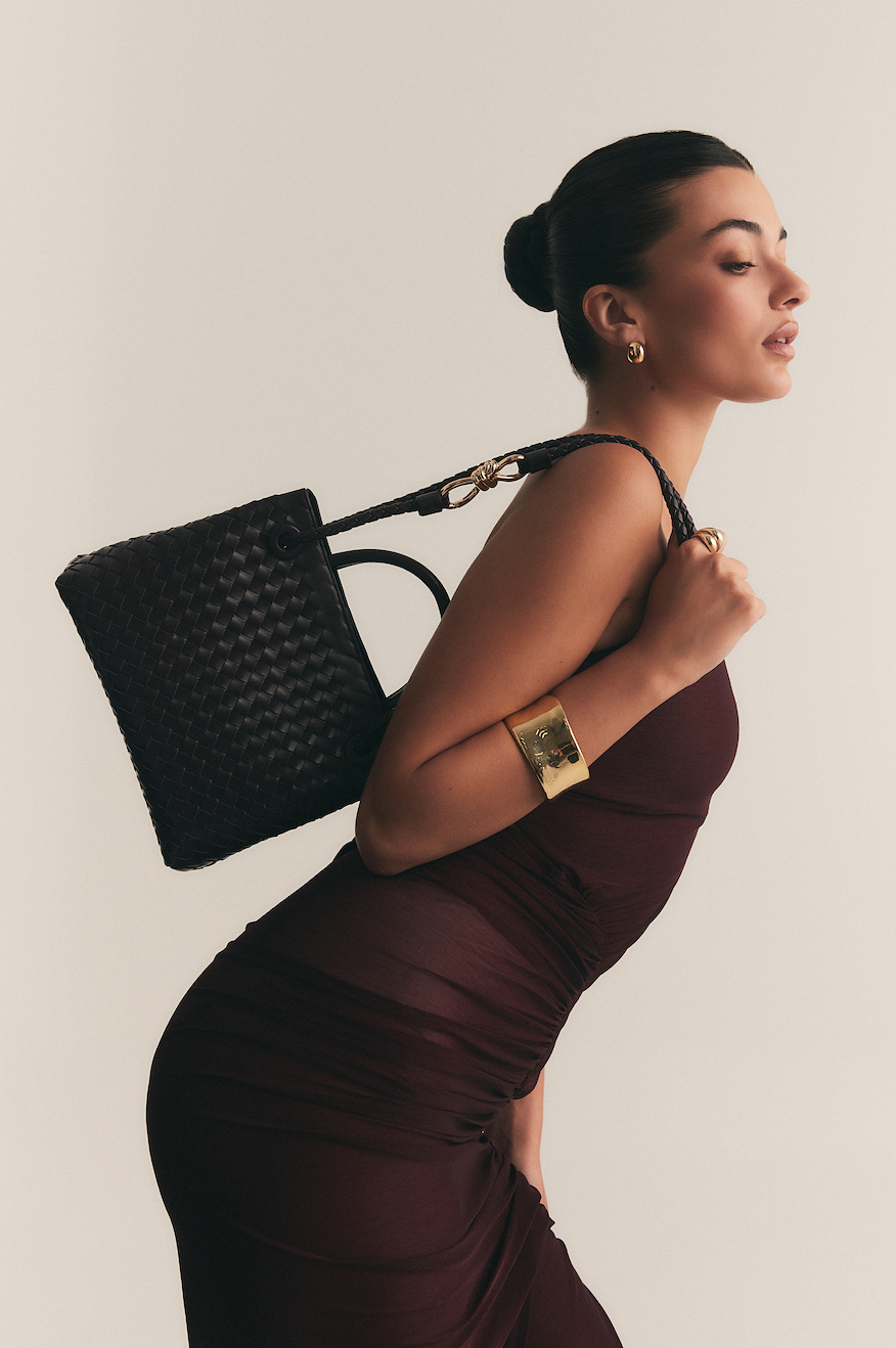 woven leather bag enhanced through texture clarity, visible stitching and refined hardware detailing for premium catalog presentation