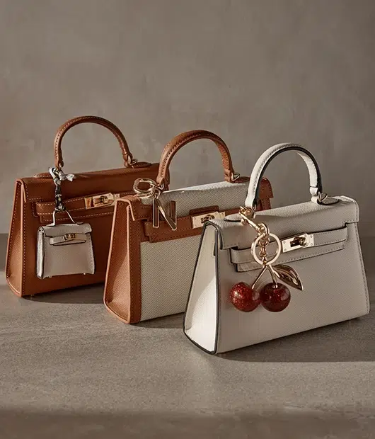 handbag collection arranged with consistent alignment, shadow balance and uniform presentation for scalable ecommerce catalogs